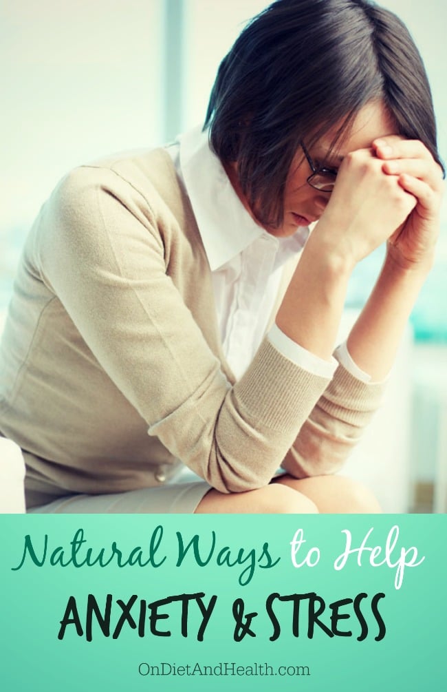 woman with her hands balled and leaning into forehead and knees