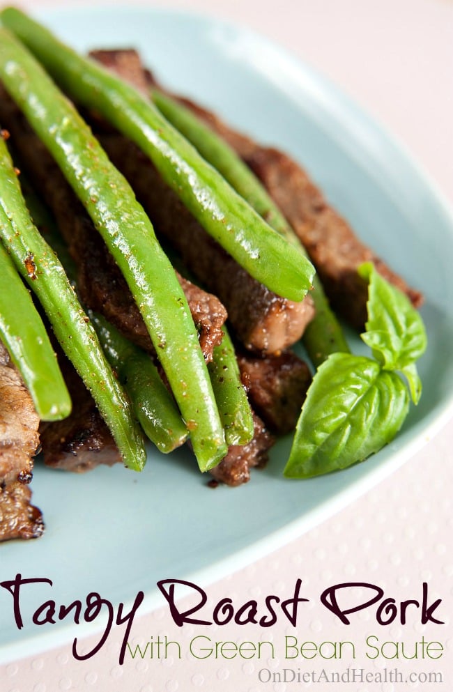 green beans and pork roast on a plate