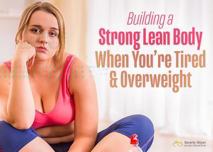 Unhappy overweight woman in exercise clothes