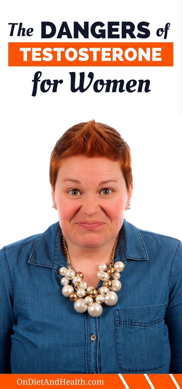 Woman with short red hair looks concerned