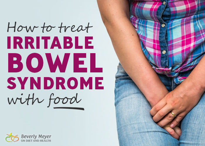 Learn to treat Irritable Bowel Syndrome with food shows a woman in pain holding her belly.